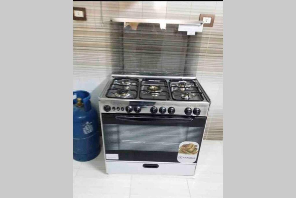 المريوطية فيصل شارع الهدايه بجانب قرية فلفلة Apartment *